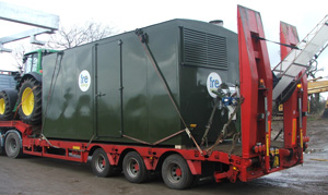 Container Unit in Transit on a low loader